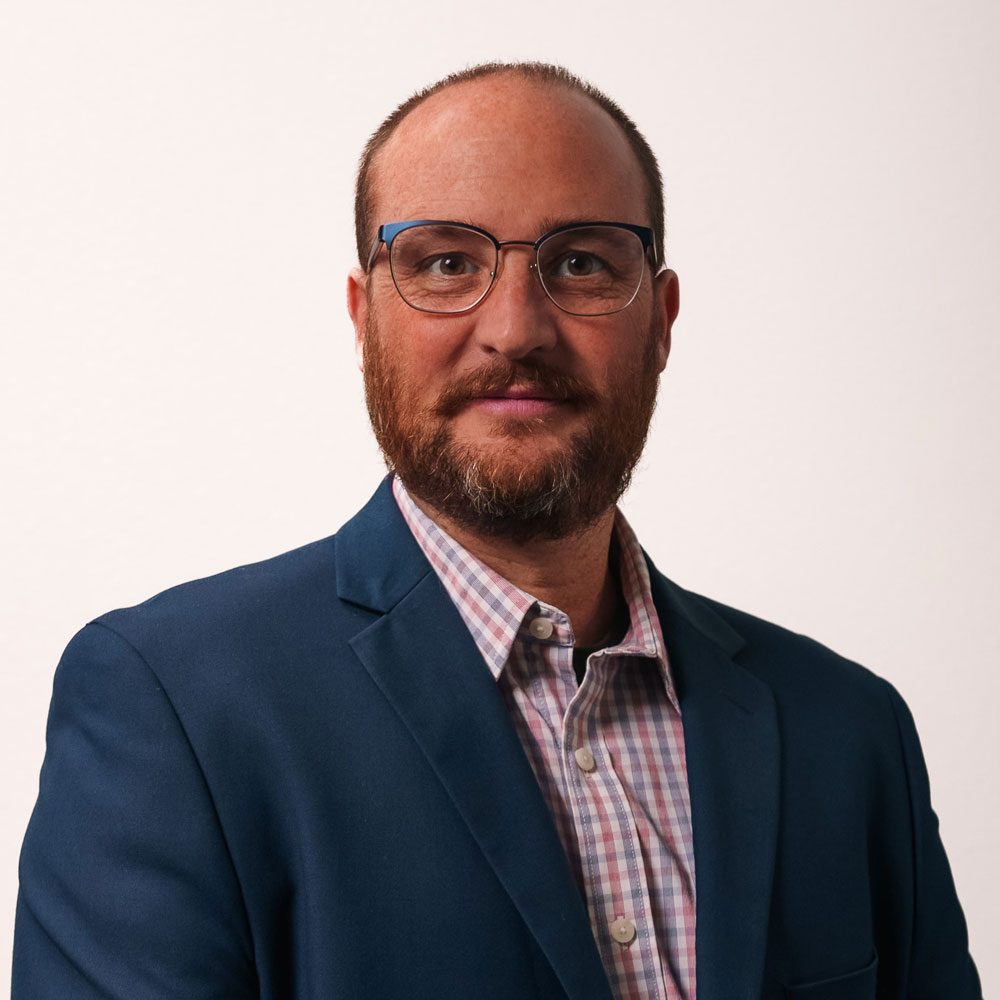 Headshot of co-founder and CEO Daniel Gibbs, Cirsium Biosciences